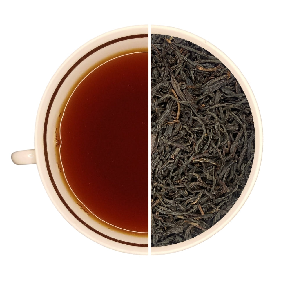 Tasse de thé infusé et vrac de thé noir nature KAIMOSI, idéal pour le matin.