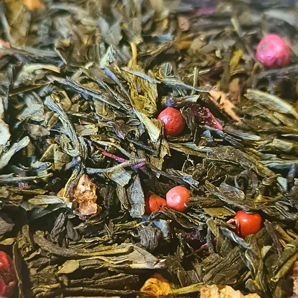 Thé vert et blanc Feu du Dragon Teavora en vrac : hibiscus, pomme, citron, poivre rose, groseille — notes acidulées