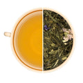 Tasse de thé infusé et vrac de thé vert et blanc LOLITA, feuilles d'olivier, orange, fraise, violette, passiflore.