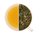 Tasse de thé infusé et vrac de thé vert FLEUR D'ORANGER, idéal pour le matin.