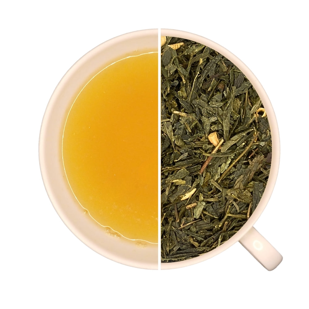 Tasse de thé infusé et vrac de thé vert FLEUR D'ORANGER, idéal pour le matin.